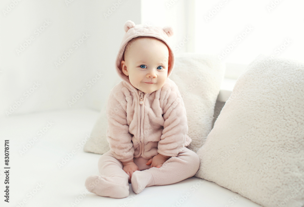 Portrait of smiling baby at home in white room Portrait of smiling baby at home in white room