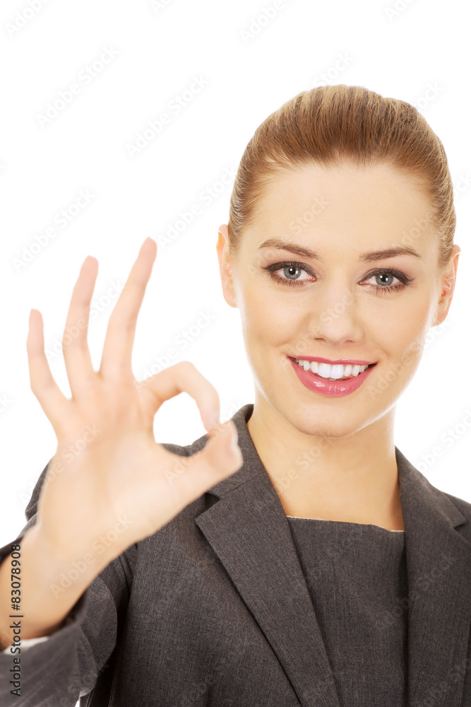 Business woman showing perfect hand sign. Business woman showing perfect hand sign.
