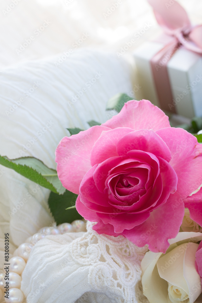 pink and orange roses with lace