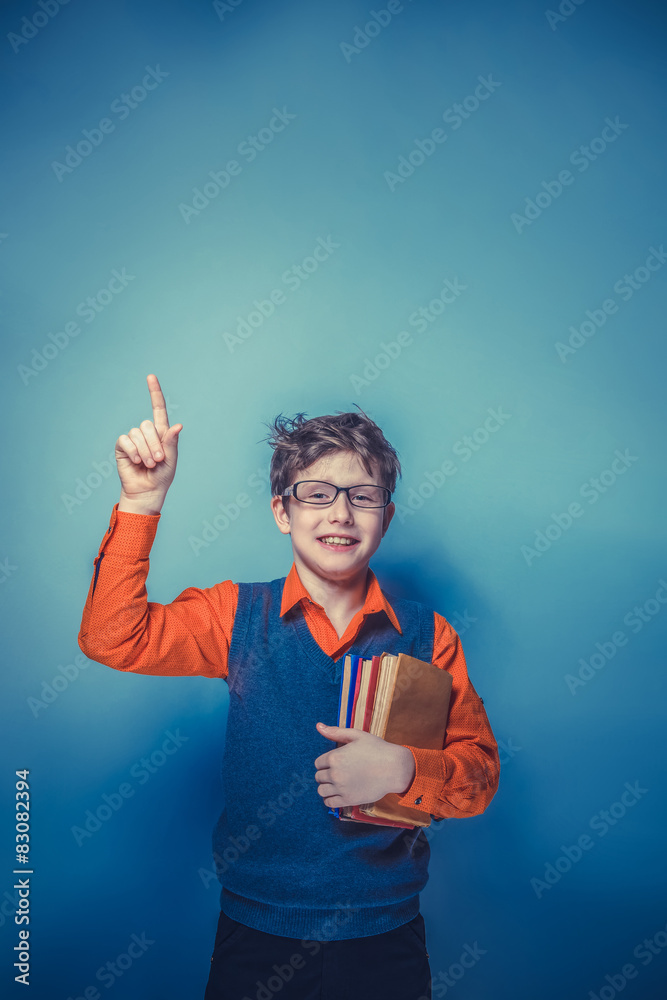 European-looking boy of ten years in glasses thumbs up, the ide European-looking boy of ten years in glasses thumbs up, the ide