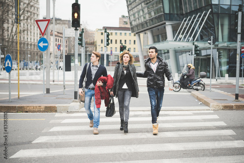 Business people crossing street in city