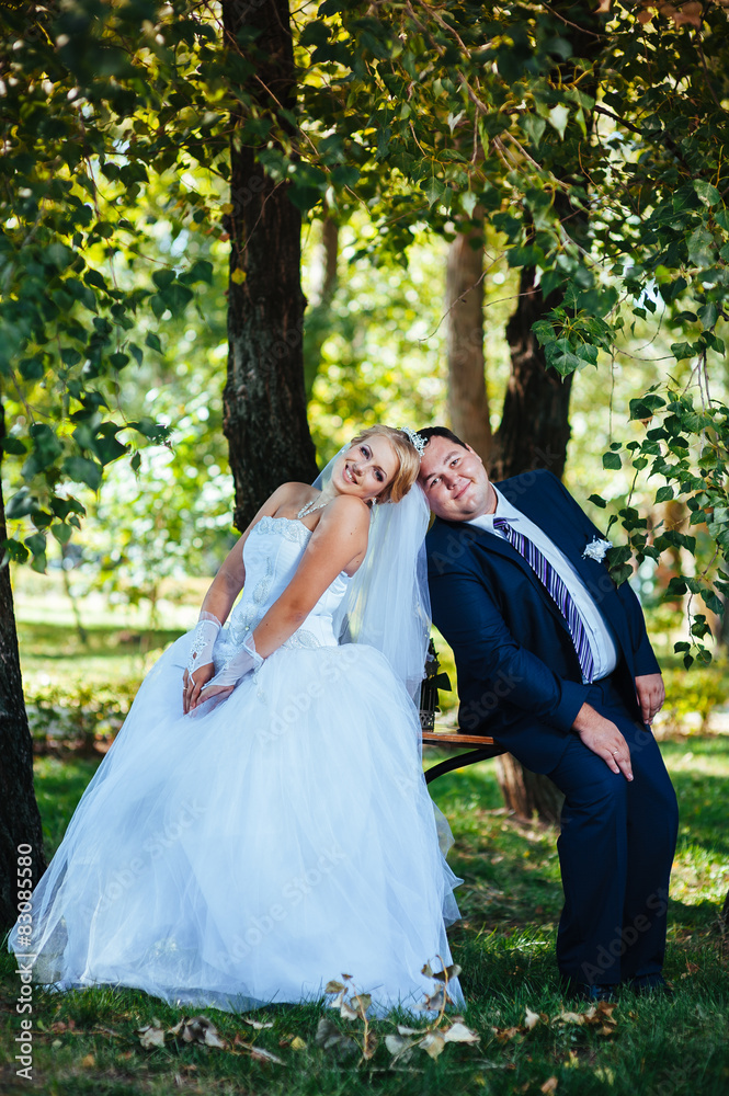 Bride and Groom at wedding Day walking Outdoors on spring nature