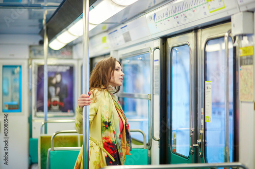 Canvas Print Young beautiful Parisian woman in subway