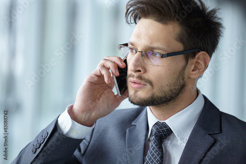 Handsome businessman on the phone