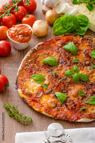 Cheese pizza with chilli and basil