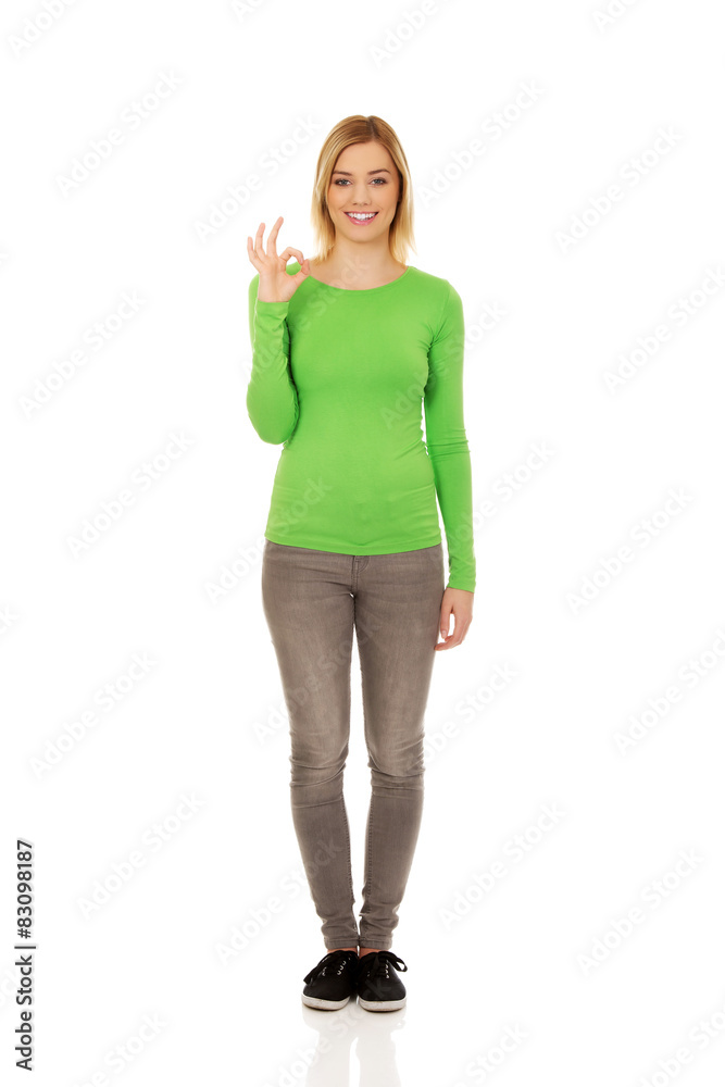 Young woman showing the perfect sign. Young woman showing the perfect sign.