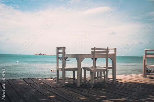 Wood dock White chair and table vintage