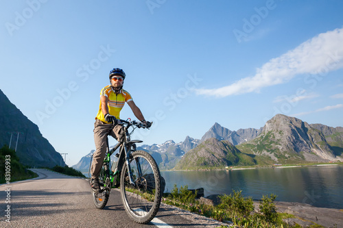 Biking in Norway against picturesque landscape © Maygutyak