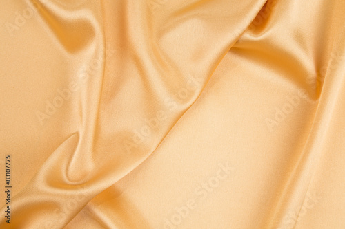 Yellow silk texture cloth. Close up.