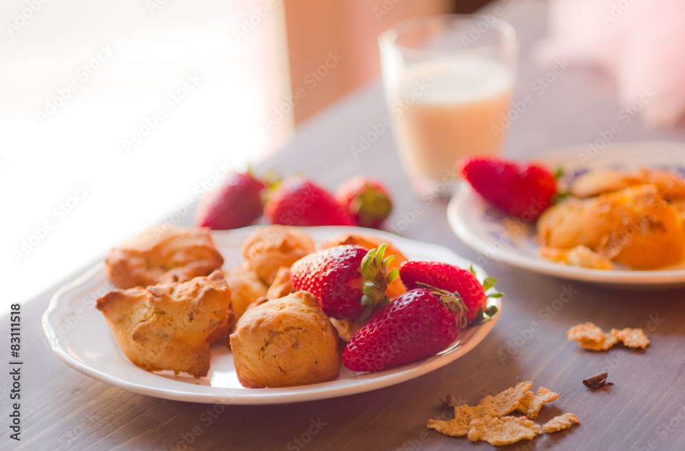 Strawberry in a plate on white background