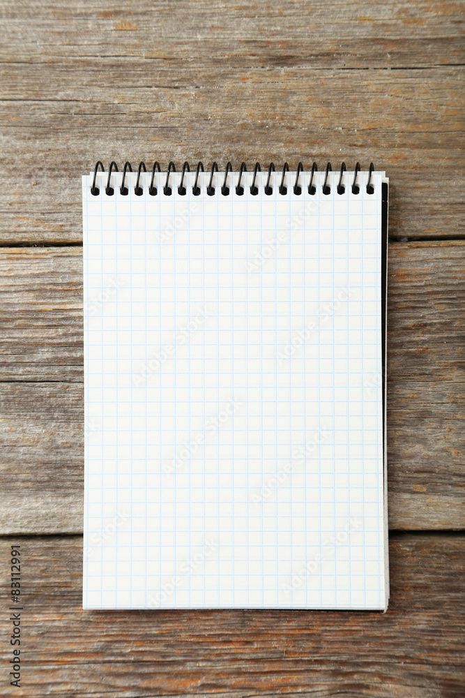 Notebook on grey wooden background Notebook on grey wooden background