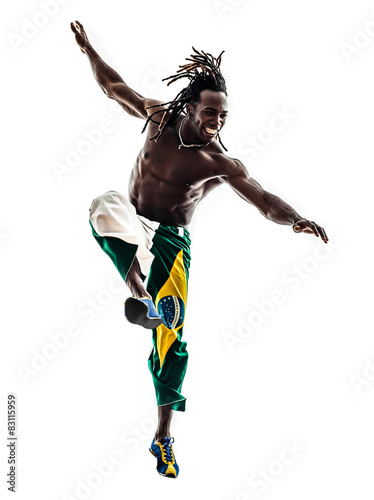 Brazilian  black man soccer player kicking football silhouette