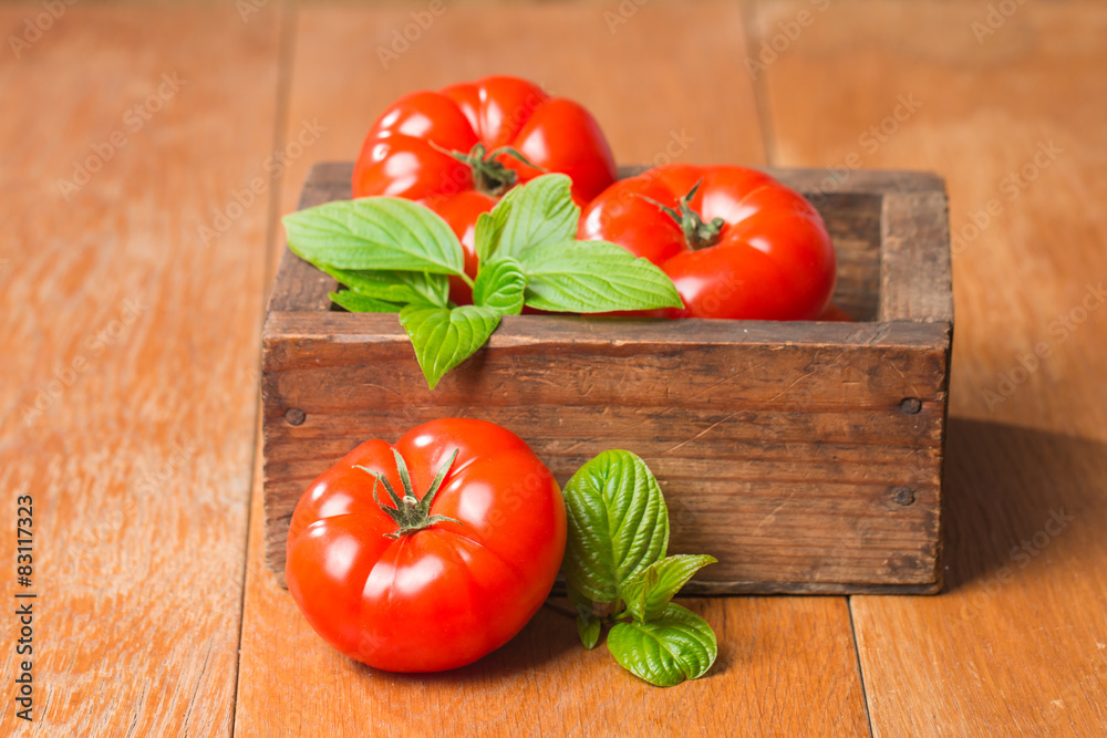 Tomatoes in wooden box Tomatoes in wooden box