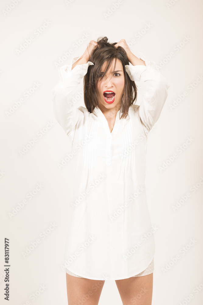 Young woman terrorized by being late. Young woman terrorized by being late.