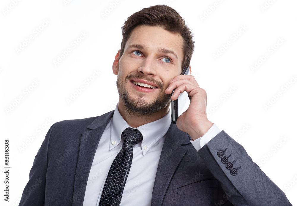 Close up of a laughing businessman on the phone isolated on whit Close up of a laughing businessman on the phone isolated on whit