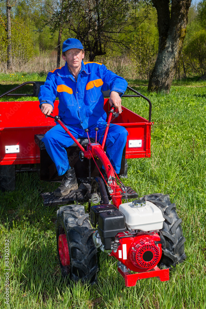 Obraz premium walk-behind tractor, farmer