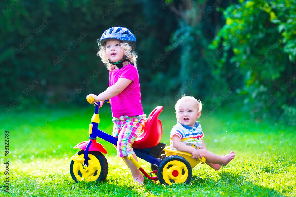 Two kids on a bike Two kids on a bike