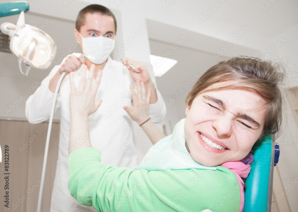 Young patient scared of a dentist