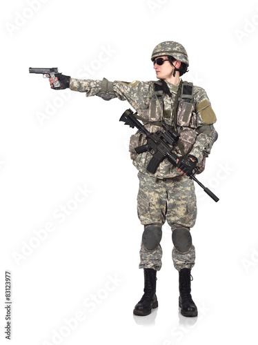 soldier shoots a gun © vetkit