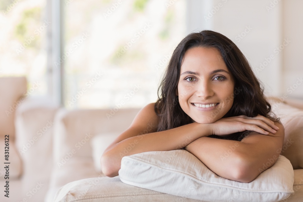 Pretty brunette relaxing on the couch Pretty brunette relaxing on the couch