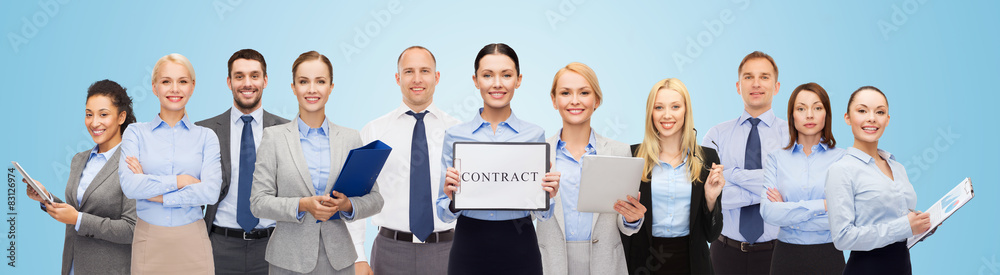 group of happy businesspeople holding contract