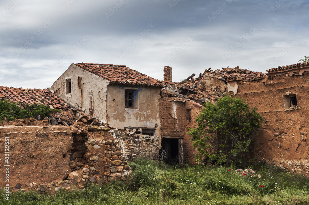 Ruins of an old stone house in rural setting