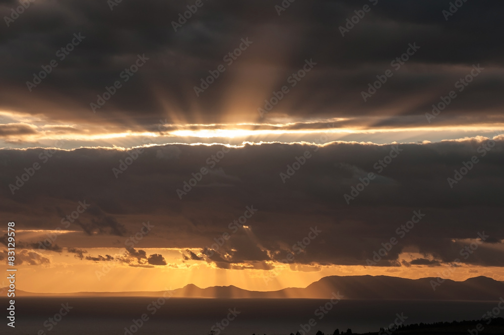Sun sets over False Bay and Kalk Bay Mountains Sun sets over False Bay and Kalk Bay Mountains