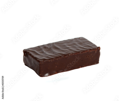 Single pastille covered in chocolate with marmalade photo