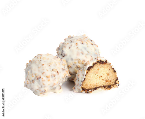 Three white truffles. One truffle cut in half