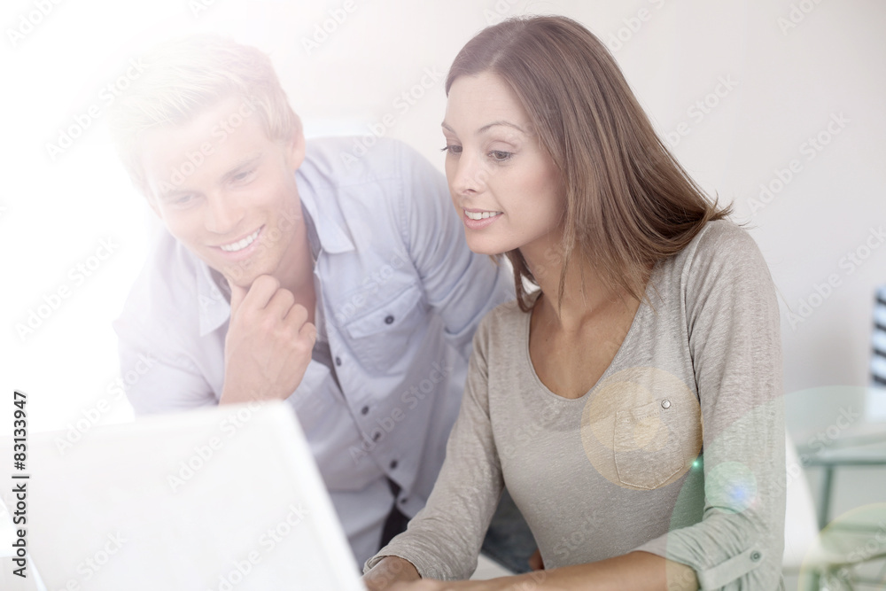 Business partners working together in office Business partners working together in office