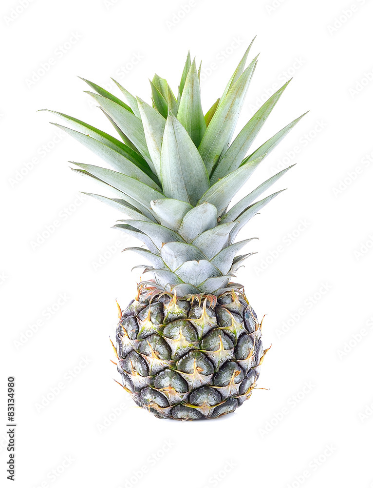 Fototapeta premium Green pineapple on isolated white background, unripe pineapple o