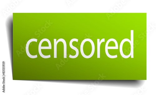 censored green paper sign on white background