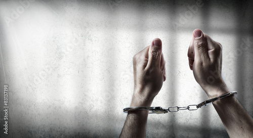 Quadro su tela arrest  - man handcuffed in cell prison