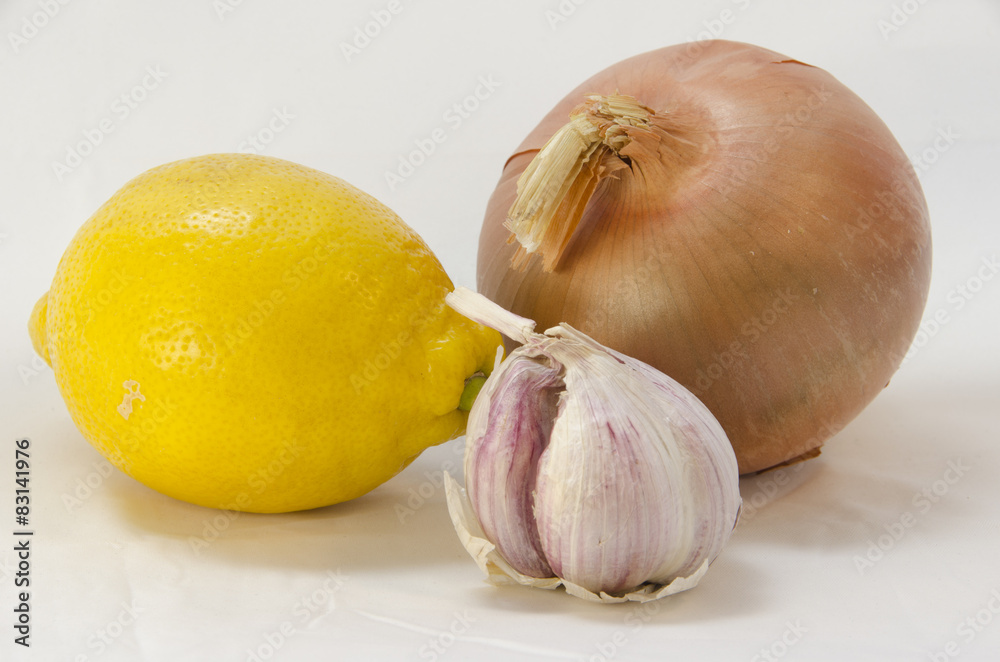 Obraz premium Ajos, limón y cebolla