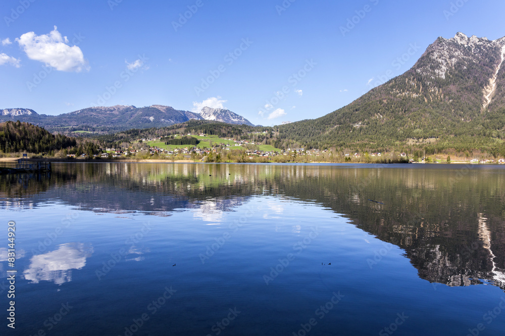 reflection of mountain village in Hallstatter See, Austria, Euro