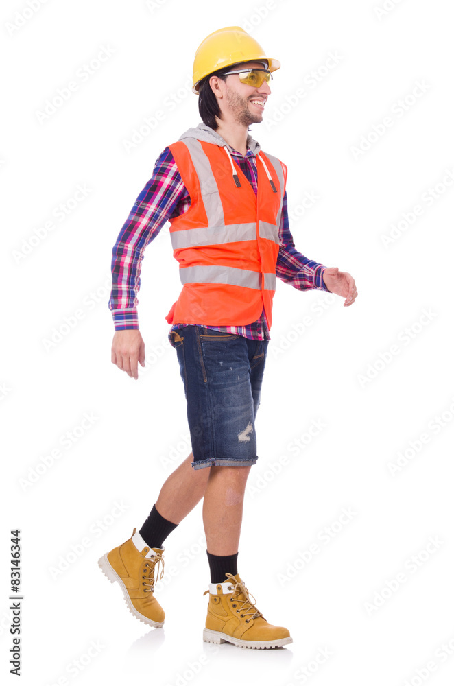 Walking young construction worker isolated on white Walking young construction worker isolated on white