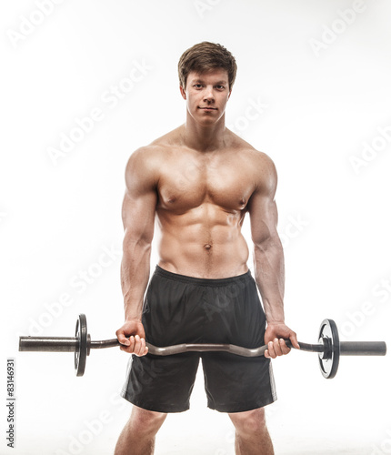 Muscular guy with barbell