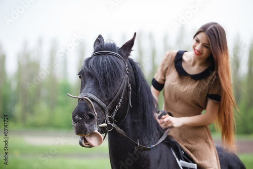 beautiful girl riding a horse © mrcats