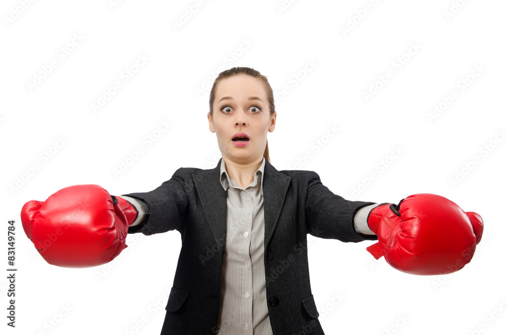 Businesswoman with boxing gloves isolated on white Businesswoman with boxing gloves isolated on white