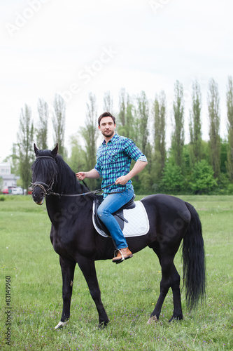 man riding a horse