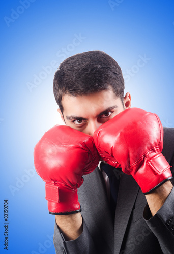 Young businessman with boxing gloves © Elnur