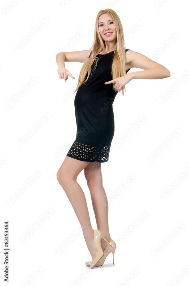 Pretty pregnant woman in mini black dress isolated on white Pretty pregnant woman in mini black dress isolated on white