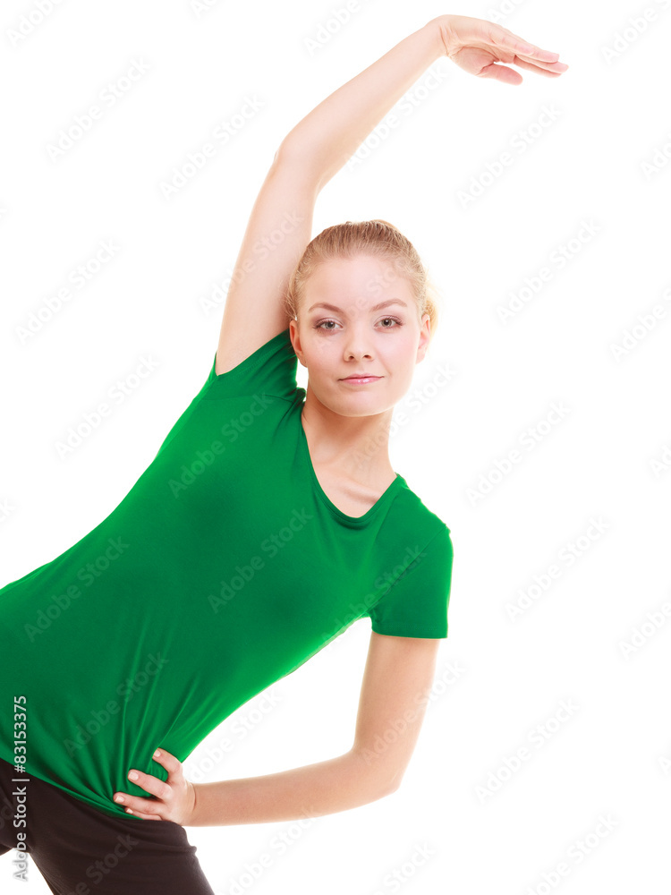 Sport. Flexible fitness girl doing stretching exercise