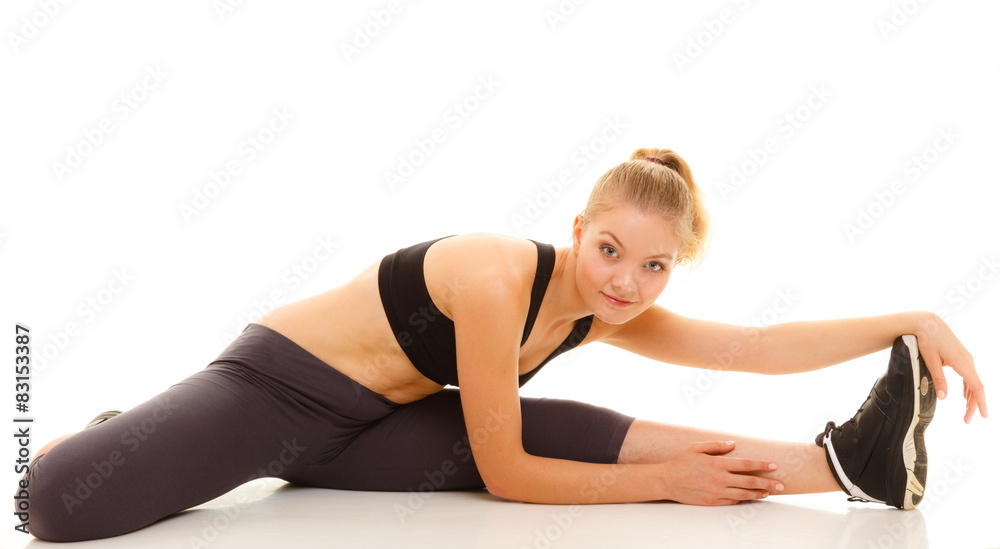 woman in sportswear doing stretching exercise woman in sportswear doing stretching exercise