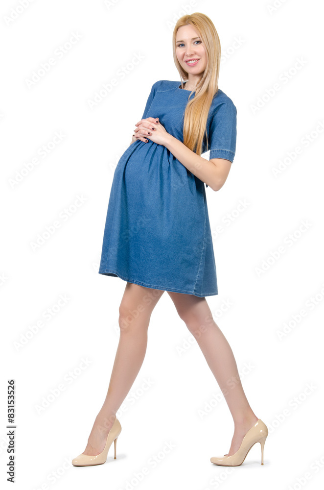 Beautiful pregnant woman in blue dress isolated on white Beautiful pregnant woman in blue dress isolated on white