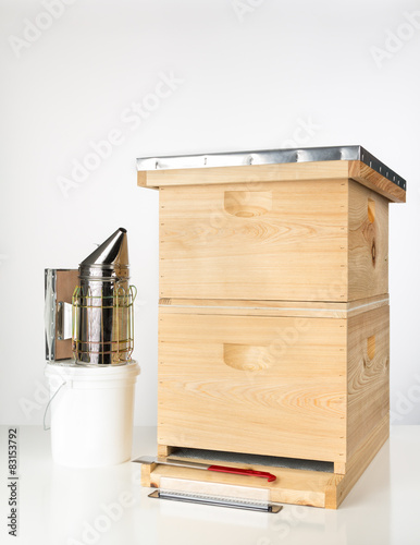 Langstroth beehive with smoker, trap, pail, etc.