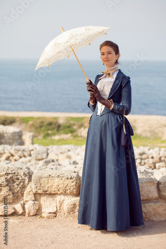 Romantic young beautiful lady outdoors