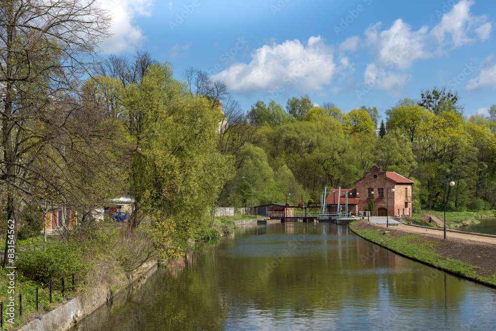 Fototapeta premium Old water mill and dam in Lidzbark Warminski