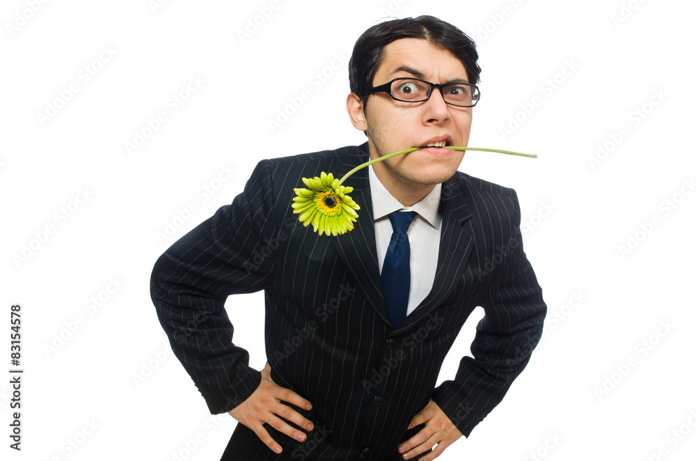 Young man in black costume with flower isolated on white Young man in black costume with flower isolated on white