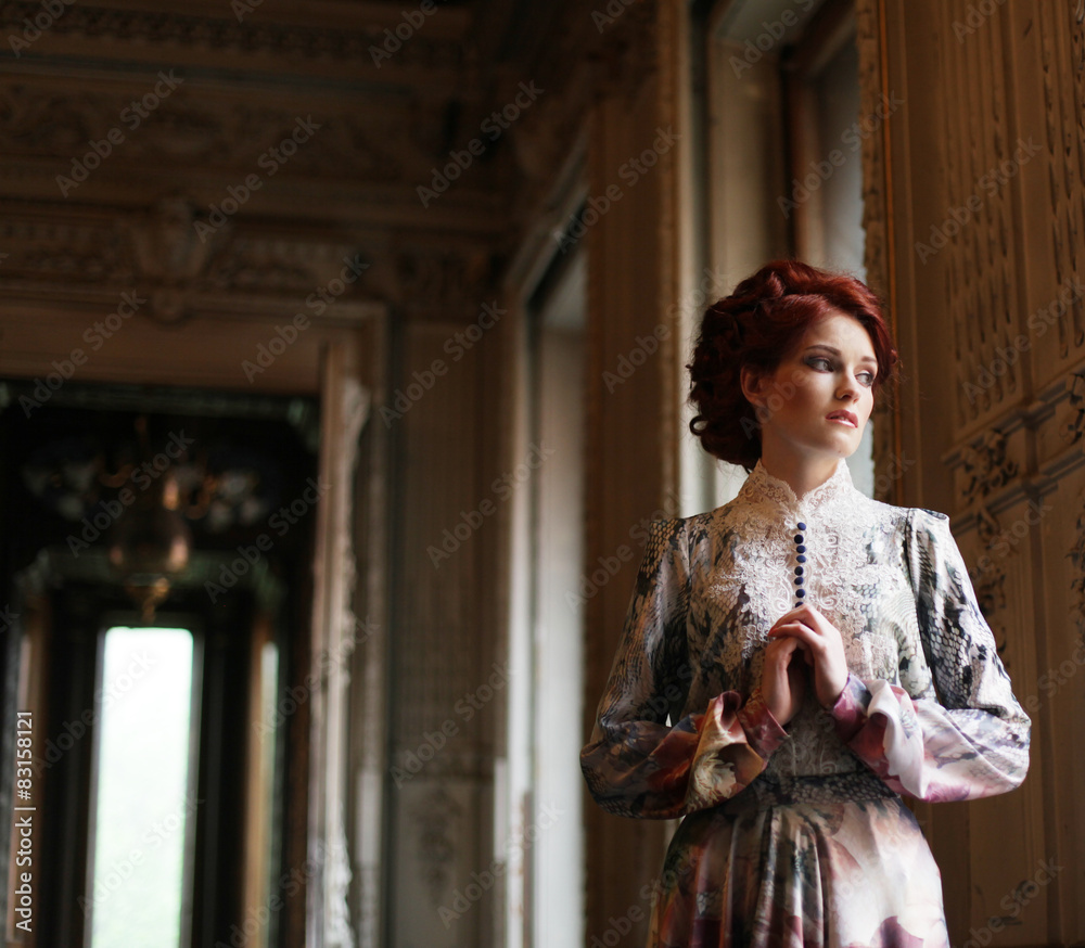 beautiful woman standing in the palace room. 